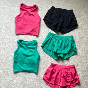 Lululemon size 4 lot.  3 pairs of shorts, 2 racerback tanks
